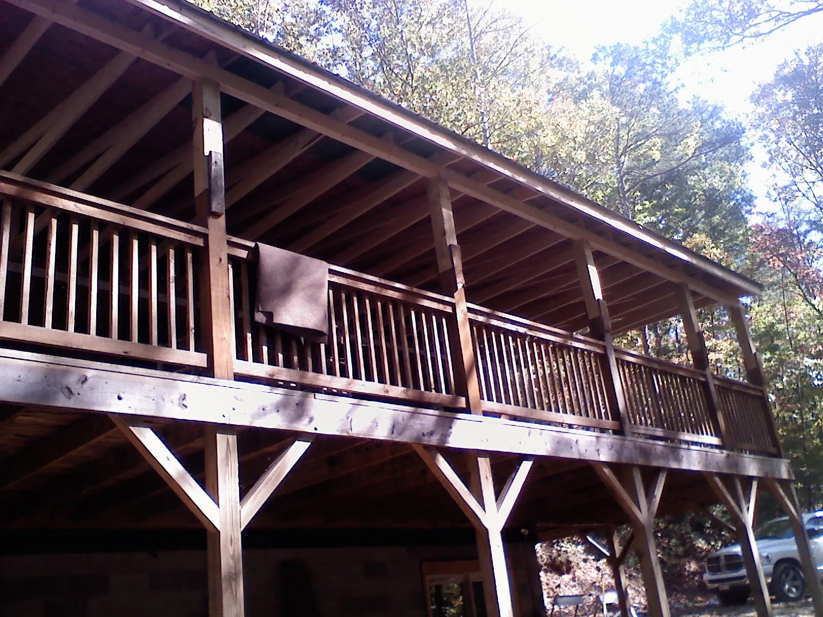 Timber framing under a new elevated porch and deck — Roof Leak Repair in Selbyville by Roofing Brothers